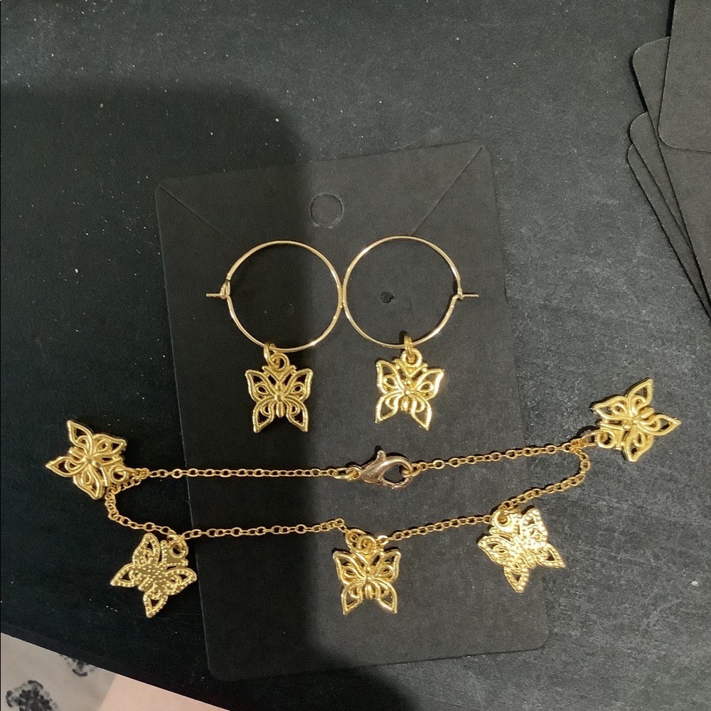 SOLD ————Butterfly bracelet and earrings set